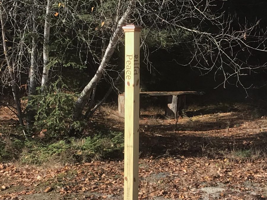 In early September, Mrs. Davie, the librarian at BMU, tasked a high school senior to wood burn the word Peace in multiple different languages on a pole to be used for Peace Day. The languages used were English, Chinese, Gujarati, and Abenaki. English, Chinese, and Gujarati are spoken at Blue Mountain, while Abenaki was used because the pole was planted on soil that belonged to the Abenaki Tribe.