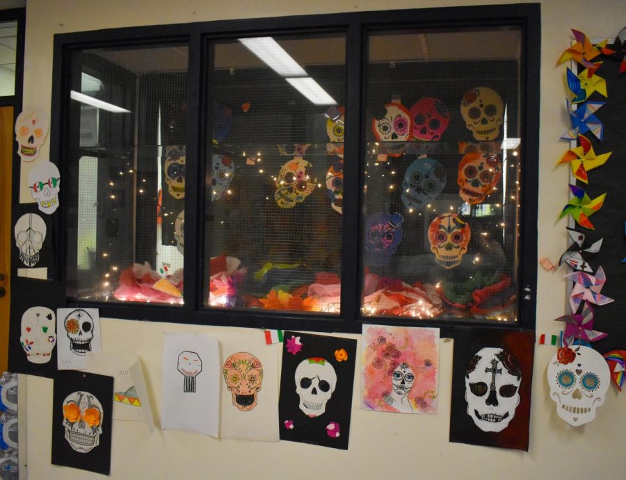 Dia De Los Muertos (Day of the Dead) begins on November 1st and ends on November 2nd. This tradition honors loved ones who have passed away. Mrs. Dube, the art teacher, asked students to help her make a display next to the Art room. 