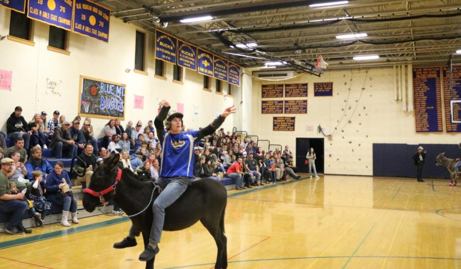 BMU Junior Hayden Carle shoots a 3-ball from downtown. It has been a number of years since Blue Mountain hosted a donkey basketball game.