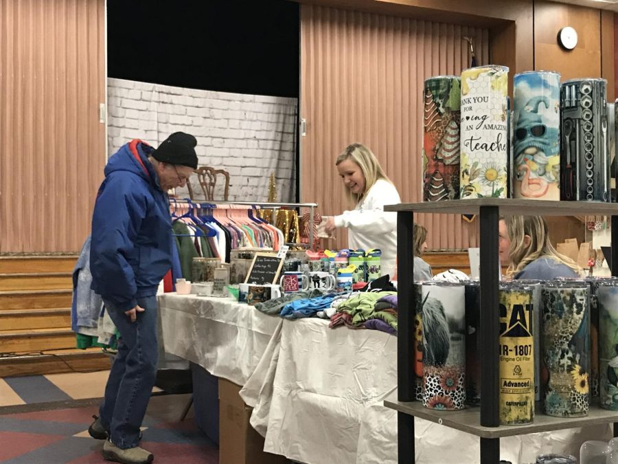 A customer peruses the goods on display. 