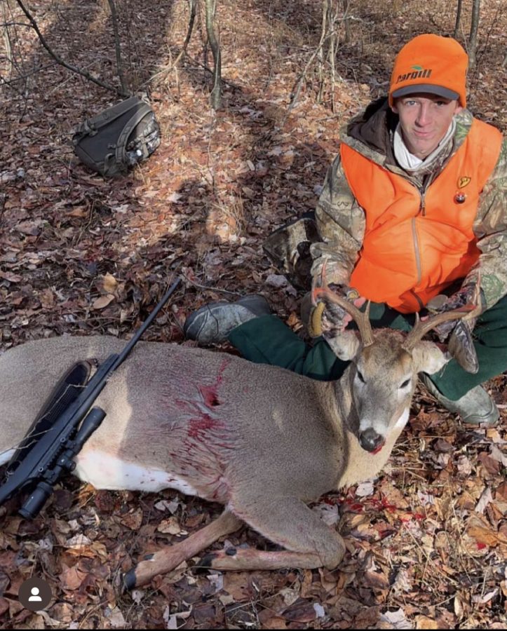Kris+Fennimore+with+his+8+point+buck.+