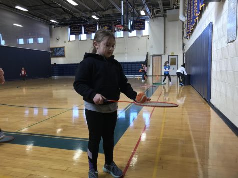 Rosalee Emery shows her tennis-ball-balancing skills to BNN staff.  