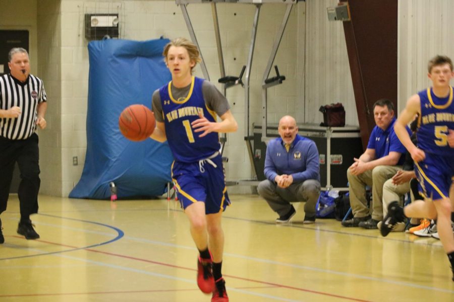 Kris Fennimore dribbles the ball up the court at Mid Vermont Christian on Friday February 10.