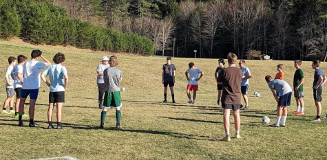 Rivers Edge soccer players receive instruction at a practice in Orford, NH.  