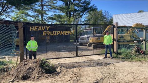 (L-R) Connor Daniels and Ricky Fennimore stand infront of the new gates on Thursday, May 18th.