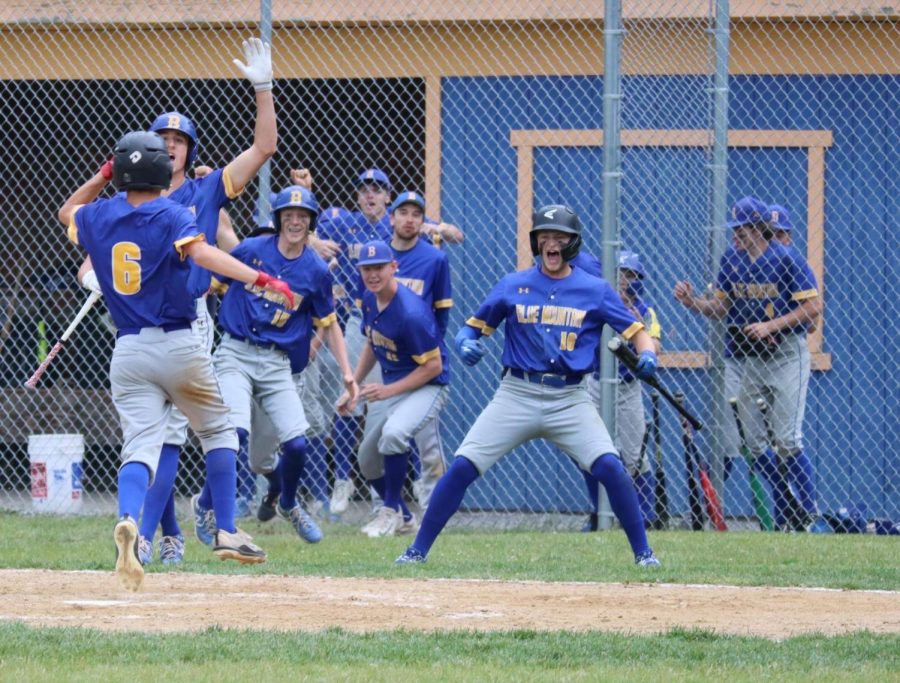 BMU celebrates as the game ending run crosses home plate to send the Bucks to their third straight championship on Tuesday, June 6th.