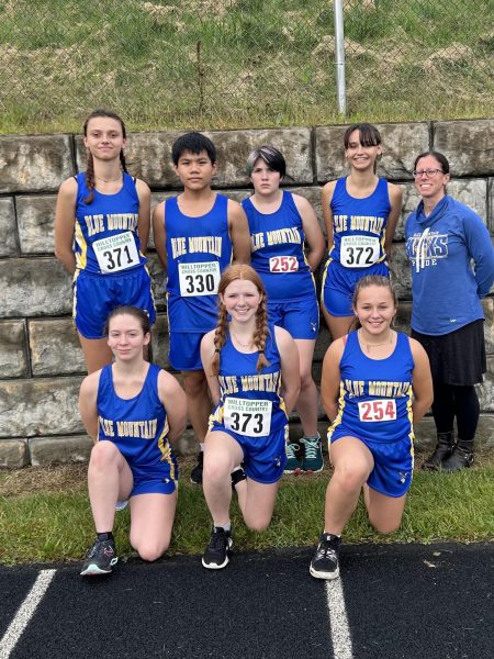 Pictured here left to right prior to their meet at St Johnsbury Academy on Wednesday September 13th.  (Back Row) Lily-Ann Morgan, Zhijie Zhong, Cameron Perkins, Nyx Desrochers, Coach Jenny Lund. (Front Row) Callie Brooks, Alexandria Deforge, Madison Frigon. 