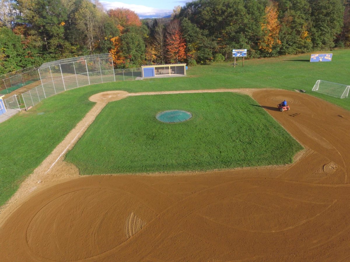 Fallball coach Willy Kingsbury drags the baseball field after the conclusion of Blue Mountains fall ball regular season. The team will compete in tournament play next weekend the 14th and 15th of October. 