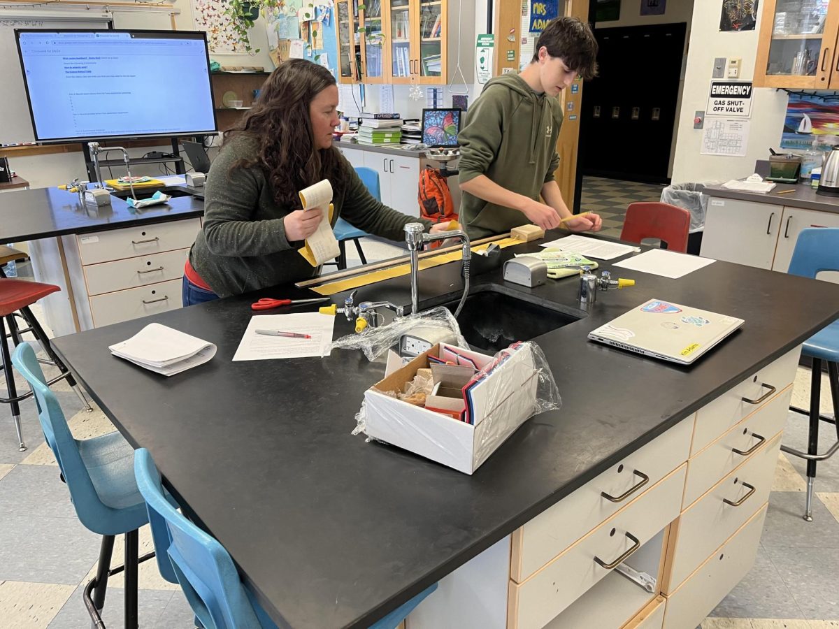 BMU Teacher Kim Adams and Lance Zornes recreate the stress of two tectonic plates sliding against each other on February 6th, 2024. The class is learning about this topic as a part of a larger study of changes in forces as they surface.