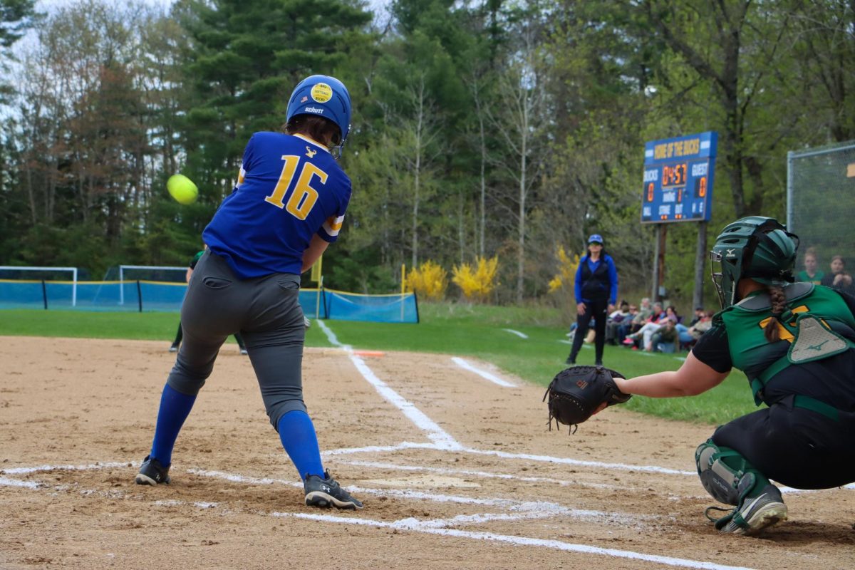 On Monday, May 13th Felicity Sulham hits a home run, scoring the first runs of the game.