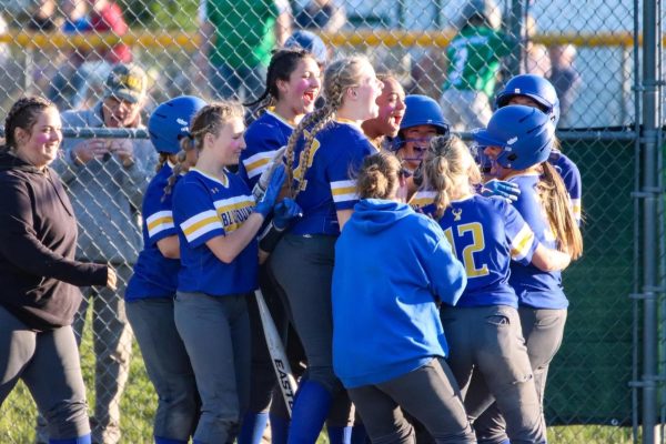 The Bucks celebrate BMU sophomore Kaylee Hamlett after she hits a home run in Northfeild on May 30th, 2024.