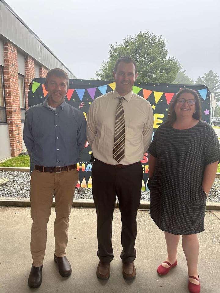  BMU administration stands in front of the school to welcome students on Monday, August 26, 2024.