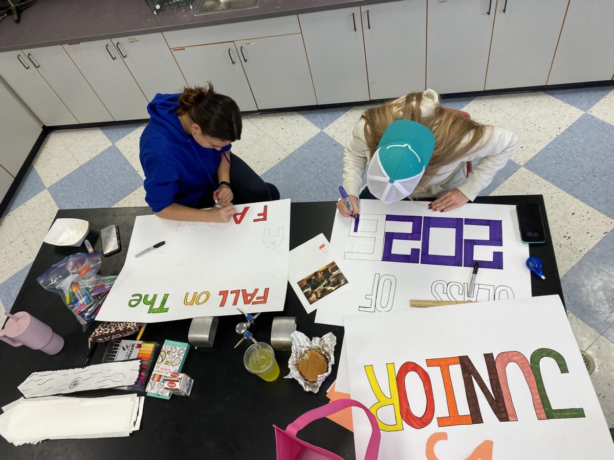 BMU juniors Lily Morgan (Left) and Lily Roy (Right) are getting ready for the Groton Fall Foliage Parade on October 4, 2024. Each class is tasked with decorating a float for the parade which takes place in Groton on Saturday, October 5, 2024.   