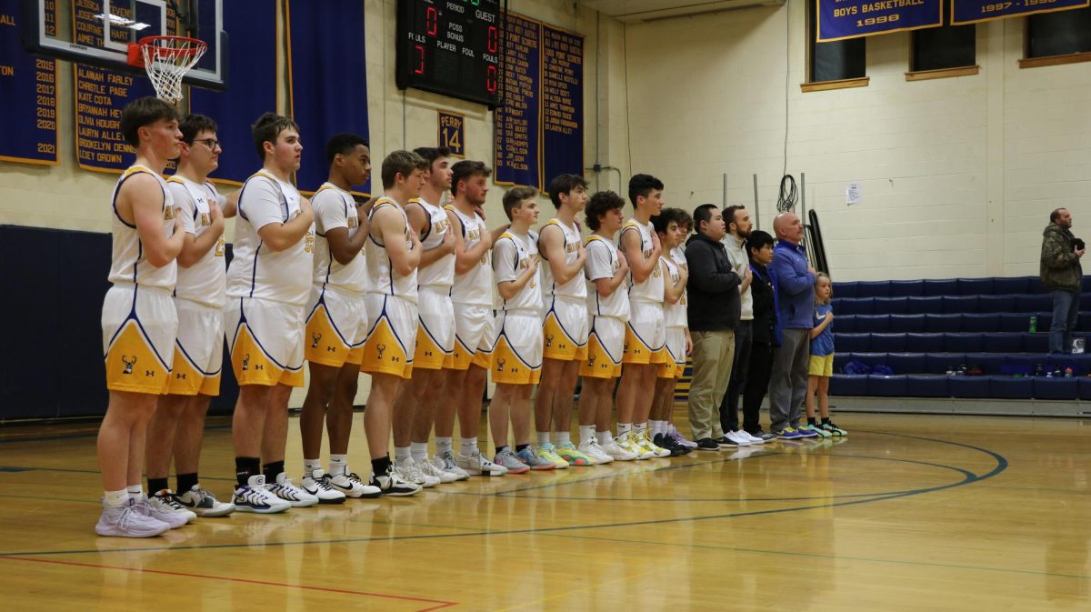 The Bucks line up for the playing of the National Anthem in the Dr. Harry M. Rowe Gymnasium, Wells River, VT.