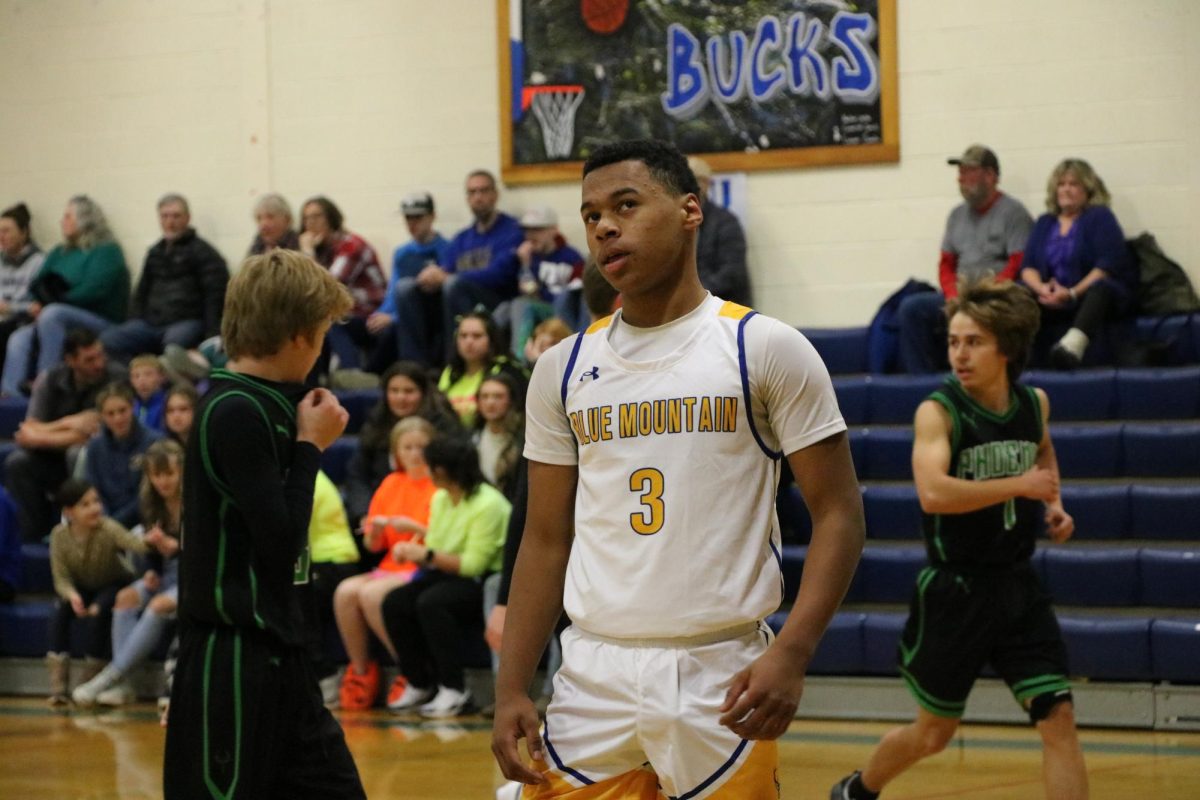 Jamal Saibou readies himself before the game in the Dr. Harry M. Rowe Gymnasium, Wells River, VT.
