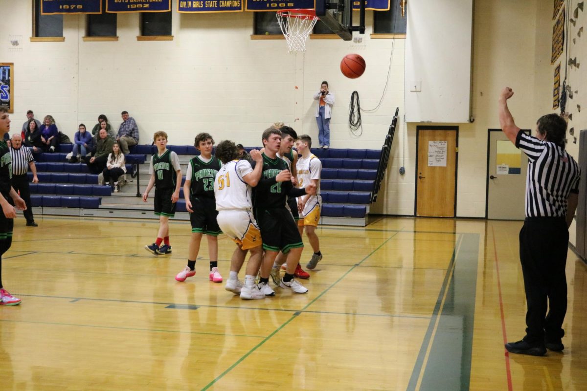 The referee calls a shooting foul on the Phoenix in the Dr. Harry M. Rowe Gymnasium, Wells River, VT.