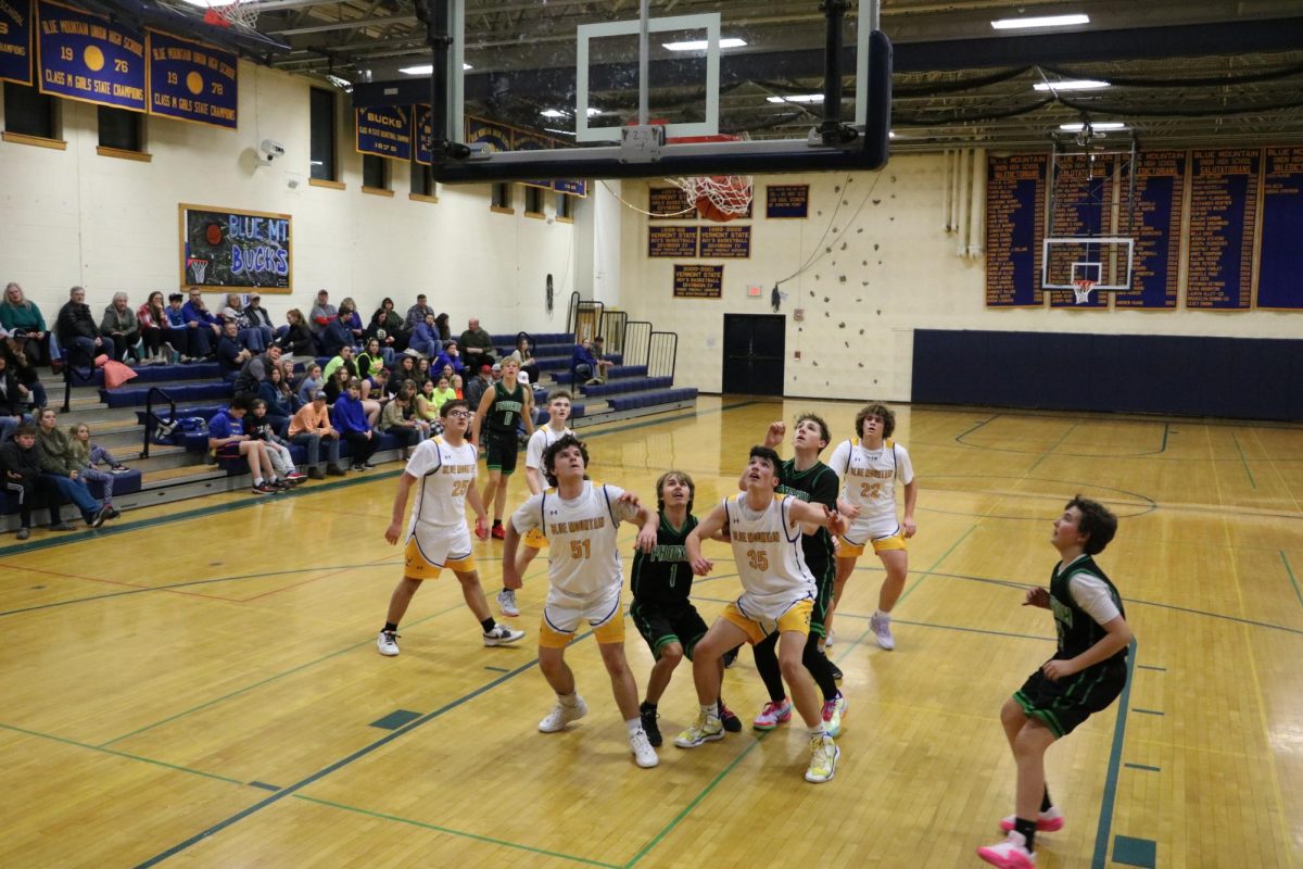 The Bucks are in position to rebound a basket while the Phoenix try to break through in the Dr. Harry M. Rowe Gymnasium, Wells River, VT.