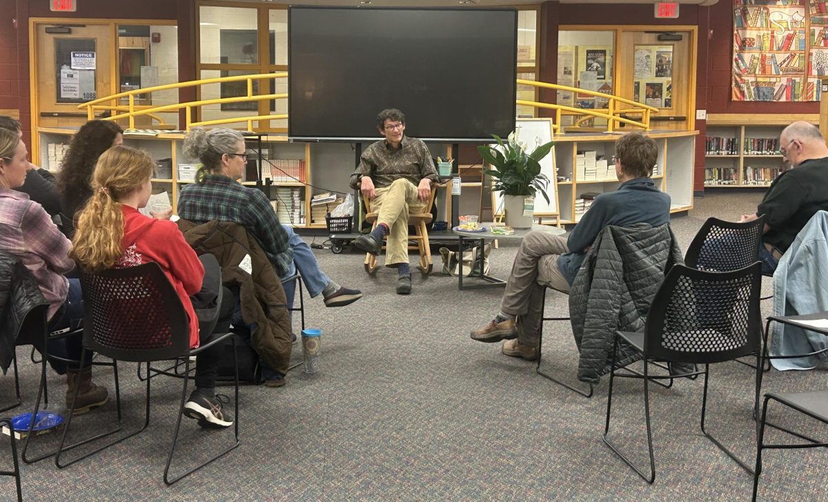 On April 9th, 2025, community members listen as Kenneth Cadow reads excerpts from his book "Gather".