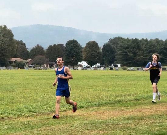 Jason Bugler, running to the finish on September 23rd , 2025, at Oxbow in Bradford VT.