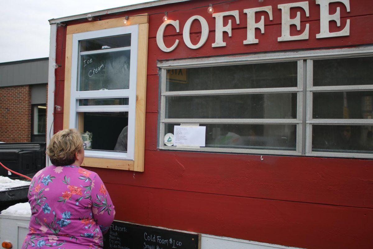 BMU staff, Mrs.Blanchard, ordering a drink from the new "Coffee Coop" on Friday, November 21st. The new coffee stand was open to students and staff members wanting a hot drink.