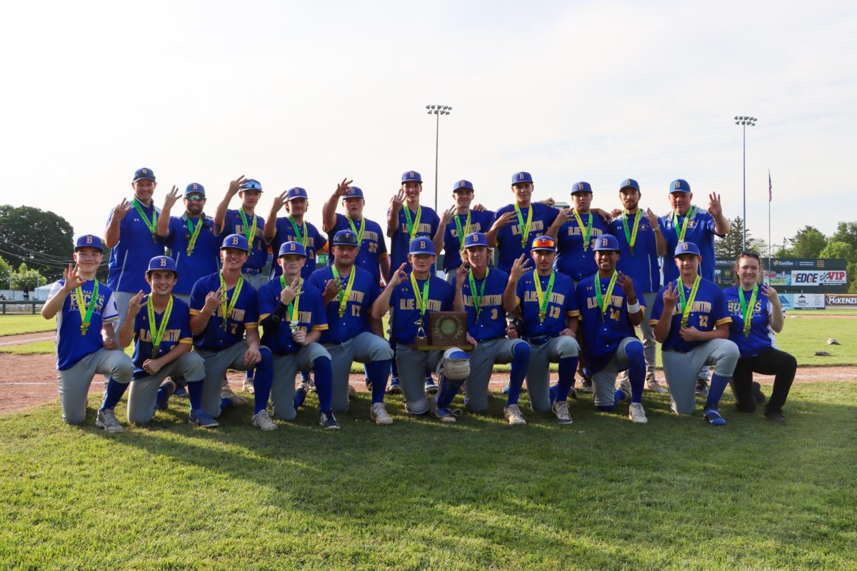 The 2025 Blue Mountain baseball team poses historic Centennial Field in Burlington VT after 4-1 victory over West Rutland, June 13. This was Coach Blood's last championship and was the teams 3rd straight.  