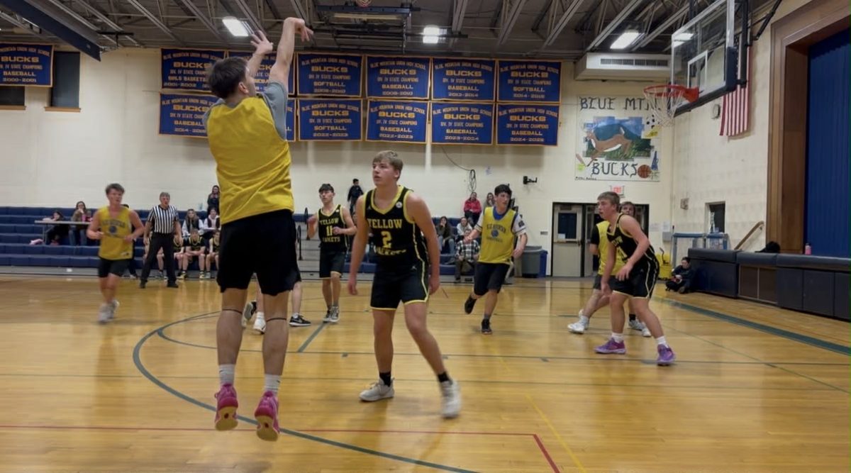 BMU senior, Dylan LaCasse shoots a three against Pittsburg-Canaan on Friday December 5th, 2025 in the Dr. Harry M. Rowe Gymnasium. Dylan is a starting guard for the varsity basketball team. 