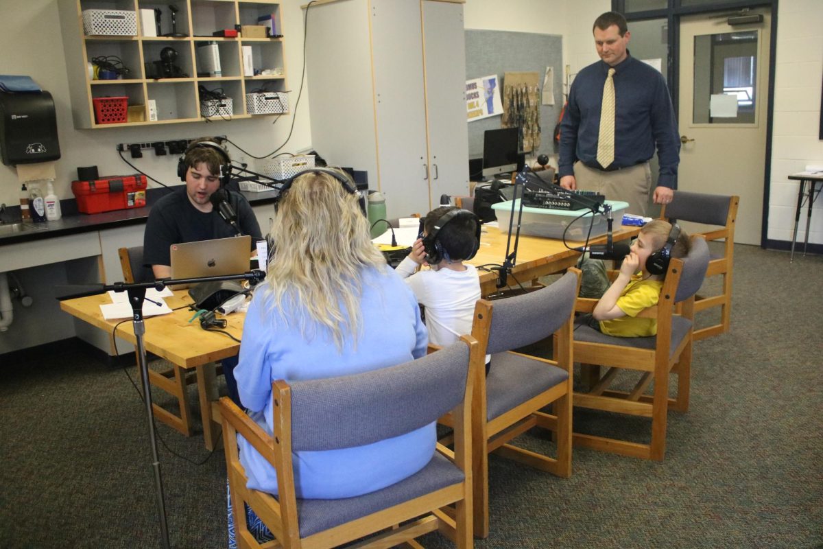 BMU Junior Jacob Roberts, works with Kindergarten students Jackson Rowe and Blake Dexter on Thursday, April 16th, 2026